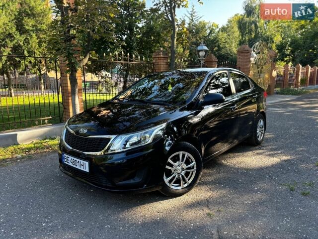 Чорний Кіа Ріо, об'ємом двигуна 1.4 л та пробігом 165 тис. км за 6900 $, фото 1 на Automoto.ua