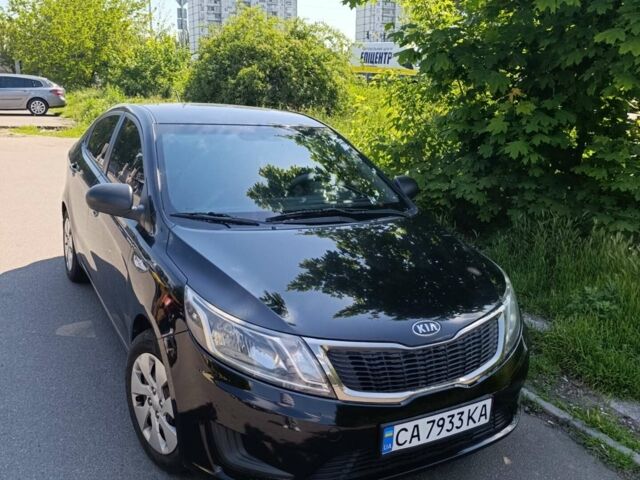 Чорний Кіа Ріо, об'ємом двигуна 1.4 л та пробігом 162 тис. км за 7500 $, фото 1 на Automoto.ua