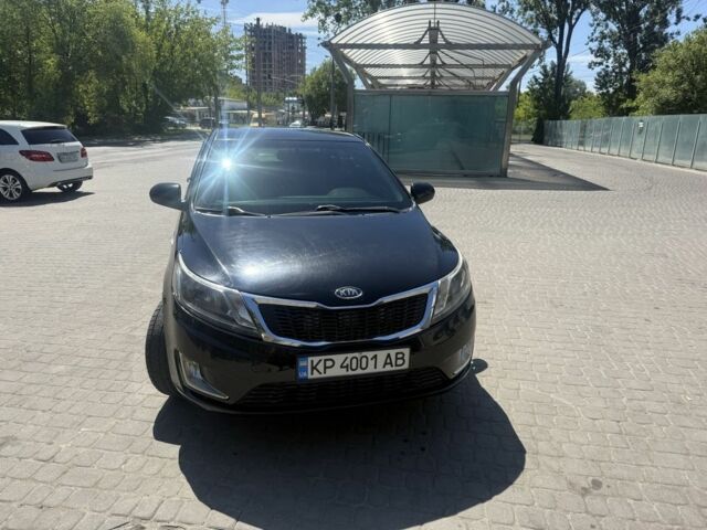 Черный Киа Рио, объемом двигателя 1.6 л и пробегом 330 тыс. км за 5500 $, фото 1 на Automoto.ua
