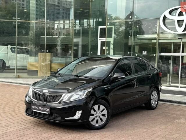 Чорний Кіа Ріо, об'ємом двигуна 1.6 л та пробігом 166 тис. км за 7821 $, фото 1 на Automoto.ua
