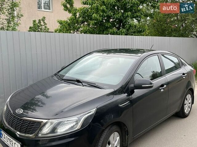 Чорний Кіа Ріо, об'ємом двигуна 1.59 л та пробігом 198 тис. км за 7900 $, фото 1 на Automoto.ua