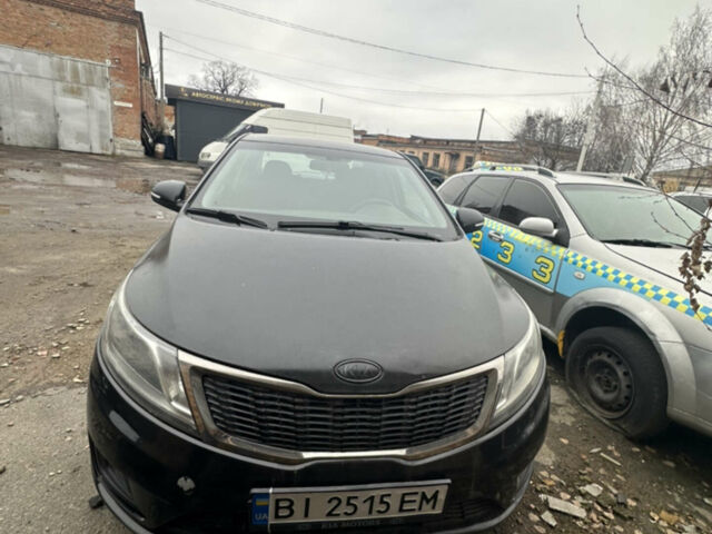 Черный Киа Рио, объемом двигателя 1.4 л и пробегом 100 тыс. км за 3200 $, фото 1 на Automoto.ua