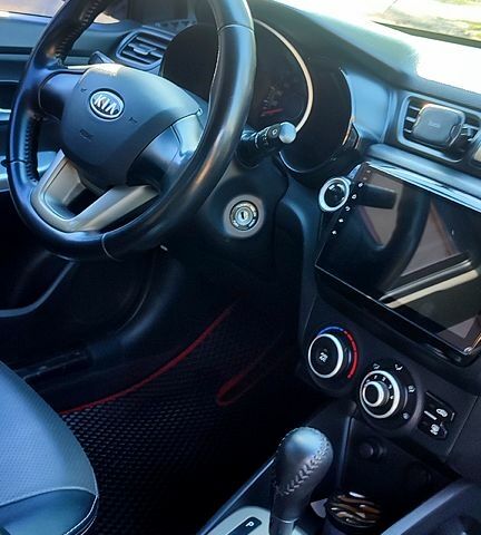 Черный Киа Рио, объемом двигателя 1.4 л и пробегом 120 тыс. км за 7700 $, фото 1 на Automoto.ua