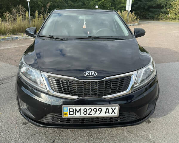 Черный Киа Рио, объемом двигателя 1.4 л и пробегом 74 тыс. км за 8900 $, фото 1 на Automoto.ua