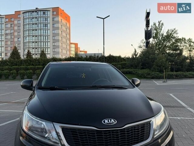 Черный Киа Рио, объемом двигателя 1.4 л и пробегом 90 тыс. км за 9000 $, фото 1 на Automoto.ua