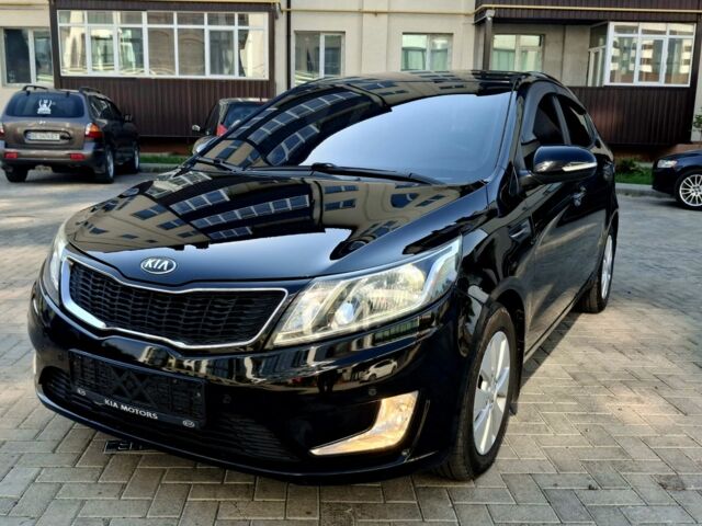 Черный Киа Рио, объемом двигателя 1.6 л и пробегом 130 тыс. км за 8750 $, фото 1 на Automoto.ua