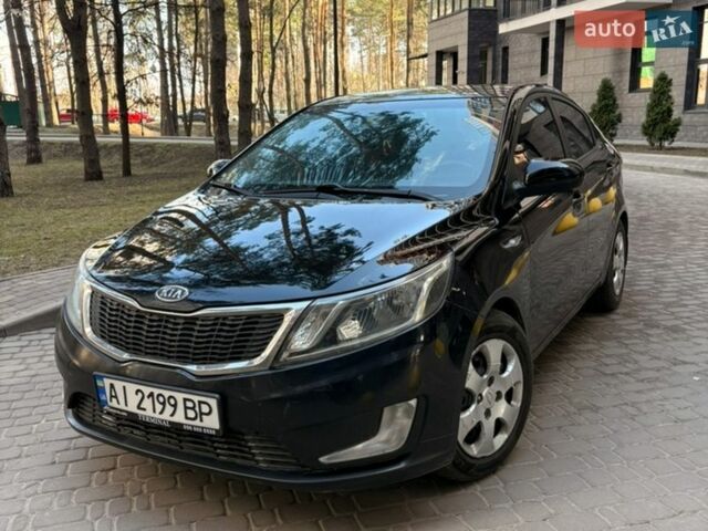 Чорний Кіа Ріо, об'ємом двигуна 1.6 л та пробігом 272 тис. км за 5950 $, фото 1 на Automoto.ua