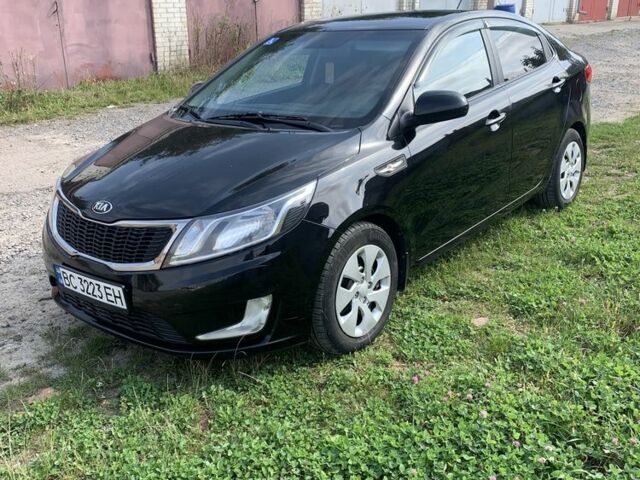 Черный Киа Рио, объемом двигателя 1.4 л и пробегом 212 тыс. км за 7800 $, фото 1 на Automoto.ua