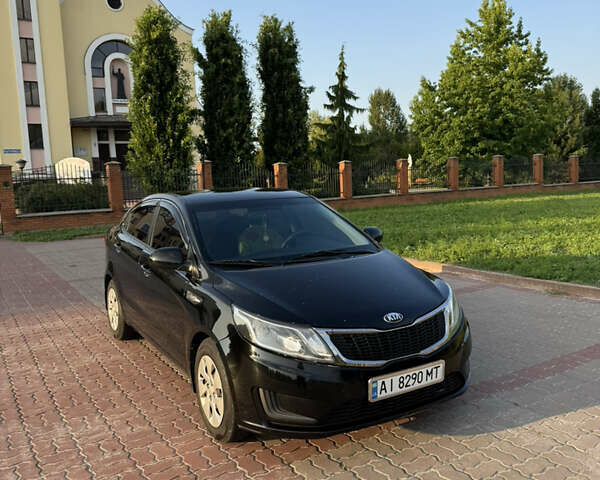 Черный Киа Рио, объемом двигателя 1.4 л и пробегом 183 тыс. км за 7000 $, фото 1 на Automoto.ua