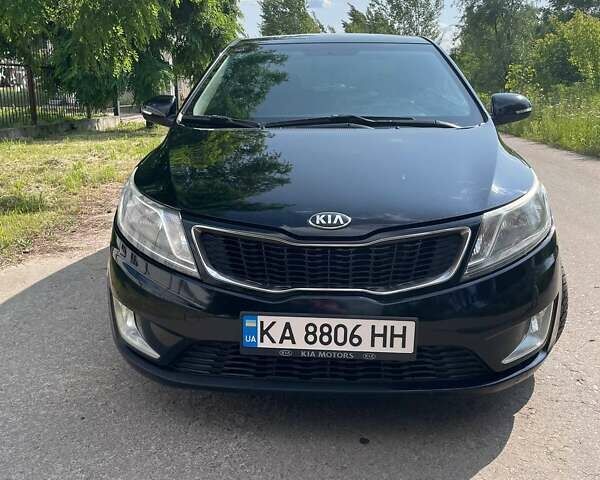 Чорний Кіа Ріо, об'ємом двигуна 1.59 л та пробігом 261 тис. км за 8200 $, фото 1 на Automoto.ua