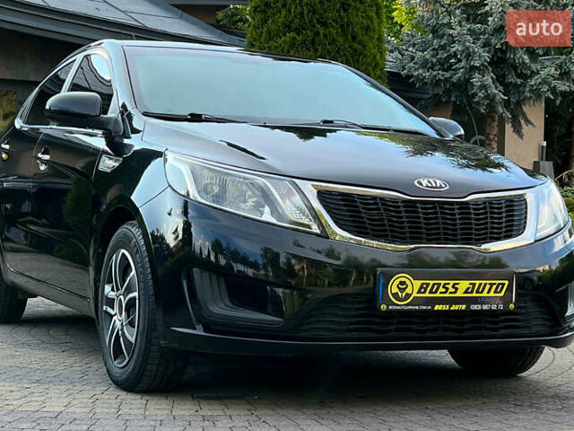 Черный Киа Рио, объемом двигателя 1.4 л и пробегом 141 тыс. км за 7990 $, фото 1 на Automoto.ua