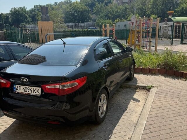Черный Киа Рио, объемом двигателя 1.4 л и пробегом 115 тыс. км за 8400 $, фото 1 на Automoto.ua
