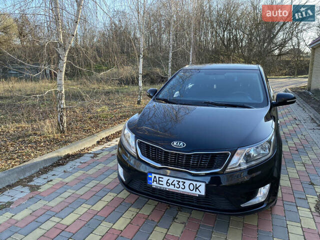 Черный Киа Рио, объемом двигателя 1.6 л и пробегом 170 тыс. км за 8600 $, фото 1 на Automoto.ua