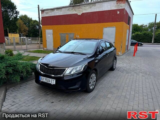 Чорний Кіа Ріо, об'ємом двигуна 1.4 л та пробігом 87 тис. км за 7700 $, фото 1 на Automoto.ua