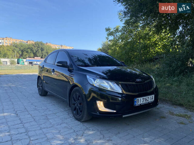 Черный Киа Рио, объемом двигателя 1.59 л и пробегом 194 тыс. км за 6700 $, фото 1 на Automoto.ua