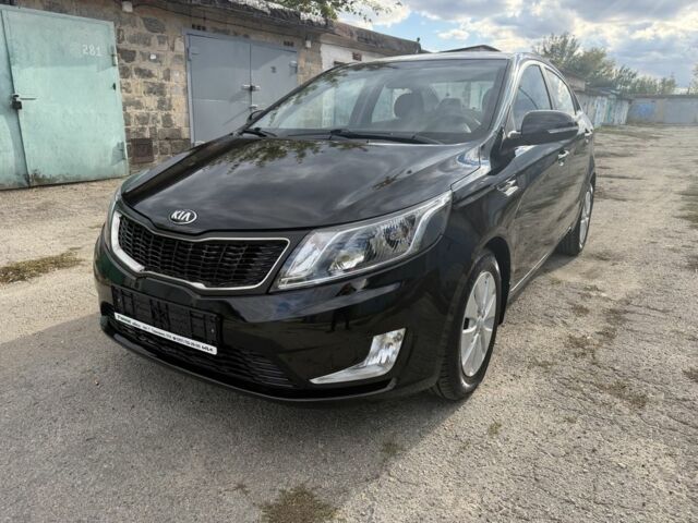 Черный Киа Рио, объемом двигателя 1.6 л и пробегом 61 тыс. км за 10319 $, фото 1 на Automoto.ua