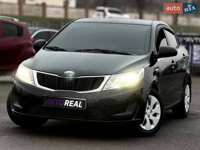 Черный Киа Рио, объемом двигателя 1.4 л и пробегом 220 тыс. км за 8200 $, фото 1 на Automoto.ua