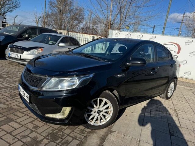 Черный Киа Рио, объемом двигателя 1.4 л и пробегом 214 тыс. км за 7700 $, фото 1 на Automoto.ua