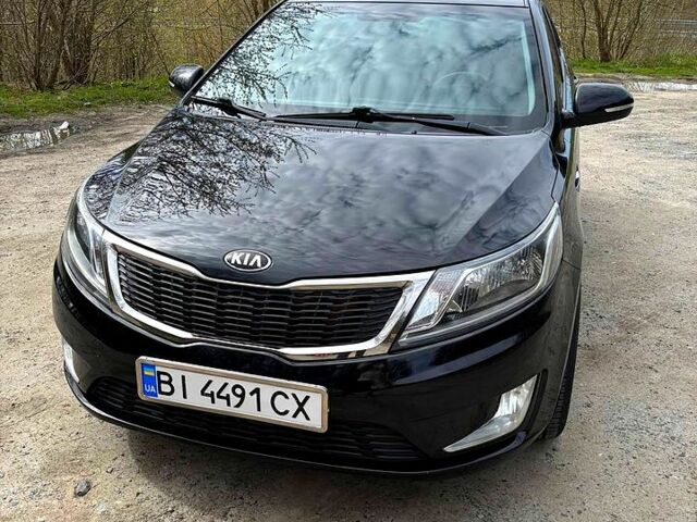 Черный Киа Рио, объемом двигателя 1.6 л и пробегом 154 тыс. км за 8000 $, фото 1 на Automoto.ua