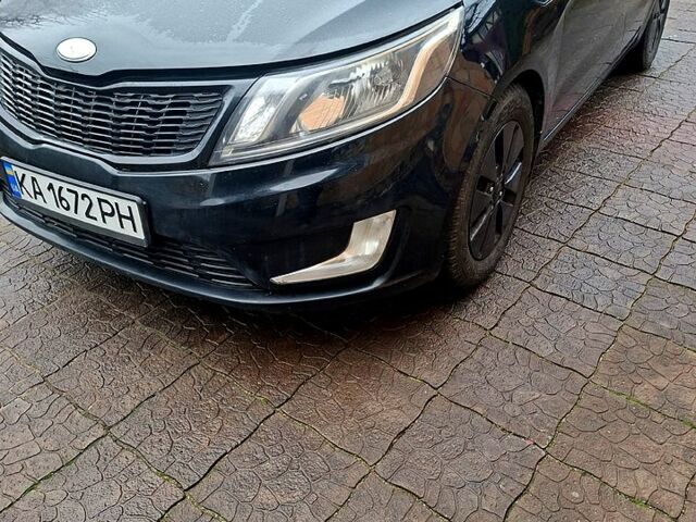 Черный Киа Рио, объемом двигателя 1.6 л и пробегом 320 тыс. км за 6500 $, фото 1 на Automoto.ua