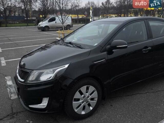 Черный Киа Рио, объемом двигателя 1.59 л и пробегом 150 тыс. км за 9000 $, фото 1 на Automoto.ua