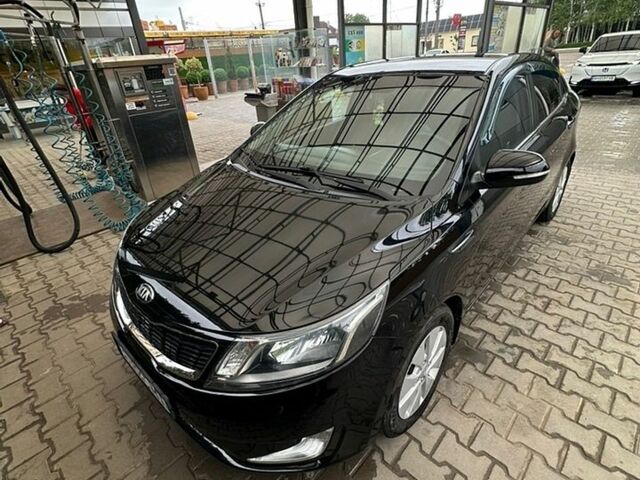 Черный Киа Рио, объемом двигателя 1.6 л и пробегом 140 тыс. км за 8500 $, фото 1 на Automoto.ua