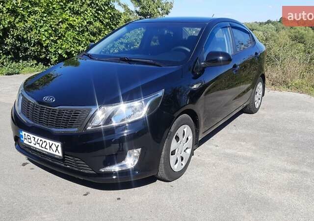 Черный Киа Рио, объемом двигателя 1.4 л и пробегом 121 тыс. км за 8600 $, фото 1 на Automoto.ua