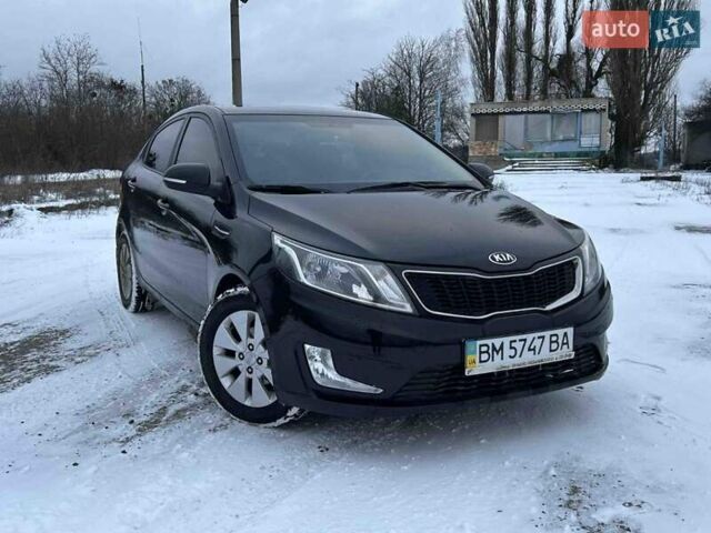 Черный Киа Рио, объемом двигателя 1.59 л и пробегом 107 тыс. км за 7950 $, фото 1 на Automoto.ua