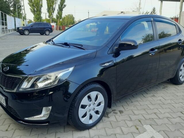 Черный Киа Рио, объемом двигателя 1.4 л и пробегом 121 тыс. км за 8300 $, фото 1 на Automoto.ua