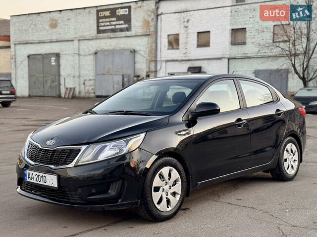Черный Киа Рио, объемом двигателя 1.4 л и пробегом 305 тыс. км за 4950 $, фото 1 на Automoto.ua