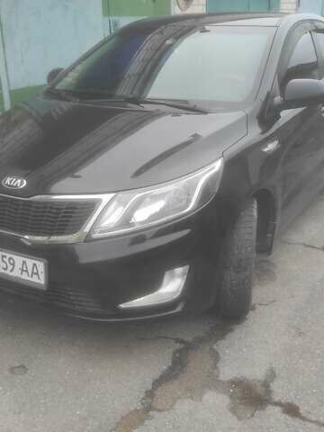 Черный Киа Рио, объемом двигателя 1.4 л и пробегом 120 тыс. км за 8500 $, фото 1 на Automoto.ua