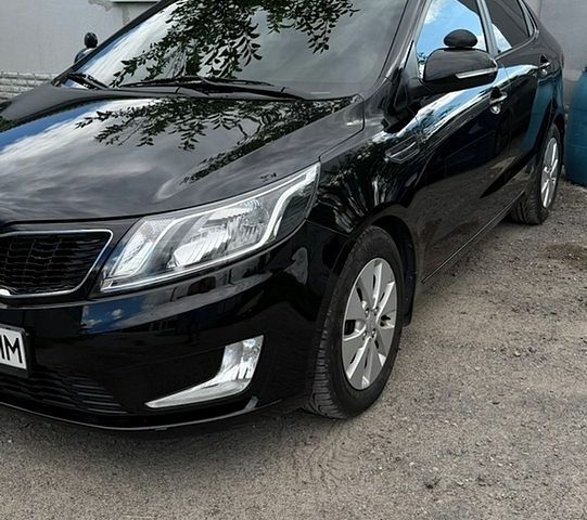 Чорний Кіа Ріо, об'ємом двигуна 1.59 л та пробігом 169 тис. км за 8700 $, фото 1 на Automoto.ua