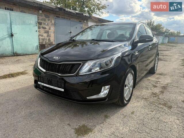 Черный Киа Рио, объемом двигателя 1.6 л и пробегом 61 тыс. км за 10300 $, фото 1 на Automoto.ua