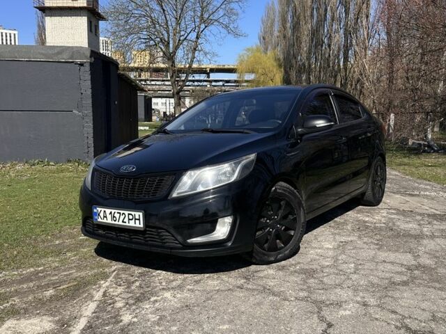 Чорний Кіа Ріо, об'ємом двигуна 1.6 л та пробігом 329 тис. км за 6000 $, фото 1 на Automoto.ua