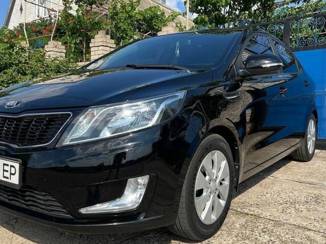 Чорний Кіа Ріо, об'ємом двигуна 1.59 л та пробігом 87 тис. км за 9499 $, фото 1 на Automoto.ua