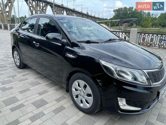 Черный Киа Рио, объемом двигателя 1.4 л и пробегом 89 тыс. км за 8300 $, фото 1 на Automoto.ua