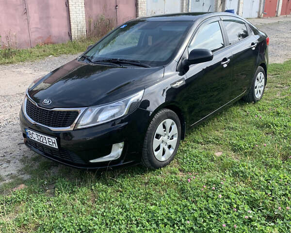 Черный Киа Рио, объемом двигателя 1.4 л и пробегом 212 тыс. км за 7800 $, фото 1 на Automoto.ua