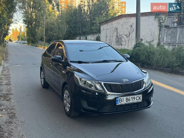 Черный Киа Рио, объемом двигателя 1.4 л и пробегом 135 тыс. км за 8000 $, фото 1 на Automoto.ua