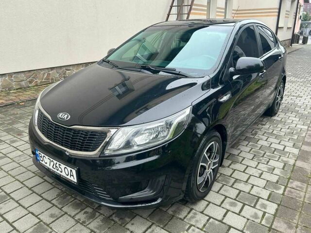 Черный Киа Рио, объемом двигателя 1.4 л и пробегом 141 тыс. км за 7200 $, фото 1 на Automoto.ua