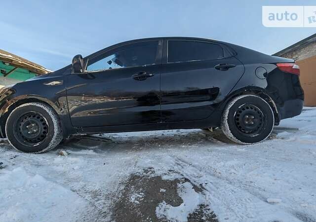 Черный Киа Рио, объемом двигателя 0 л и пробегом 125 тыс. км за 7600 $, фото 1 на Automoto.ua