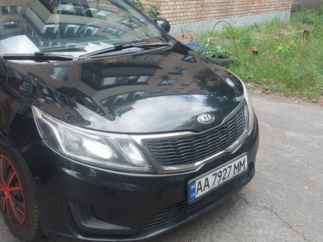 Черный Киа Рио, объемом двигателя 1.4 л и пробегом 320 тыс. км за 6200 $, фото 1 на Automoto.ua