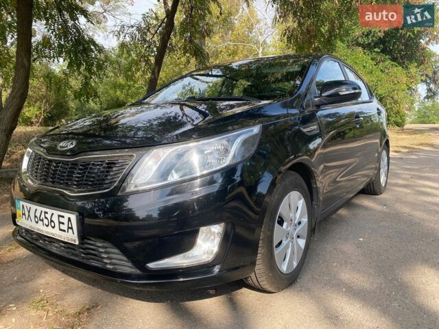 Черный Киа Рио, объемом двигателя 1.6 л и пробегом 61 тыс. км за 8200 $, фото 1 на Automoto.ua