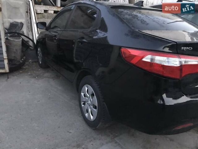 Черный Киа Рио, объемом двигателя 1.4 л и пробегом 102 тыс. км за 2350 $, фото 1 на Automoto.ua