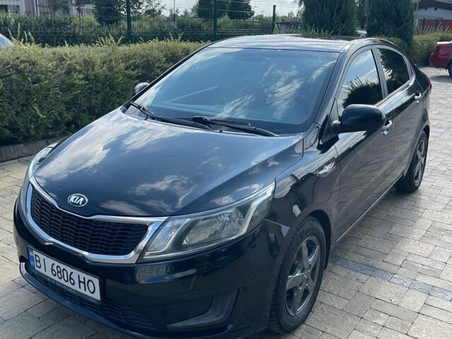 Черный Киа Рио, объемом двигателя 1.4 л и пробегом 247 тыс. км за 7800 $, фото 1 на Automoto.ua