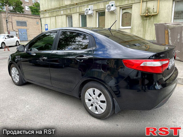 Черный Киа Рио, объемом двигателя 1.6 л и пробегом 137 тыс. км за 8799 $, фото 1 на Automoto.ua