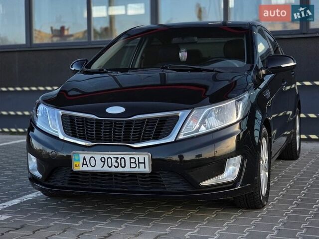 Черный Киа Рио, объемом двигателя 1.6 л и пробегом 192 тыс. км за 6999 $, фото 1 на Automoto.ua