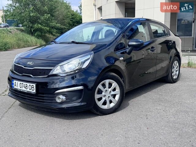 Чорний Кіа Ріо, об'ємом двигуна 1.4 л та пробігом 179 тис. км за 7200 $, фото 1 на Automoto.ua