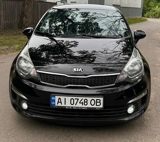 Чорний Кіа Ріо, об'ємом двигуна 1.4 л та пробігом 180 тис. км за 6900 $, фото 1 на Automoto.ua