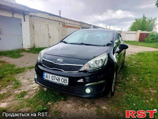 Чорний Кіа Ріо, об'ємом двигуна 1.4 л та пробігом 179 тис. км за 6100 $, фото 1 на Automoto.ua