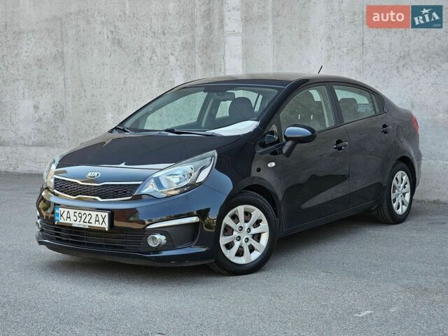 Чорний Кіа Ріо, об'ємом двигуна 1.4 л та пробігом 91 тис. км за 11900 $, фото 1 на Automoto.ua
